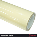 A sports car with Cream Yellow paint protection film colored wrap is parking in the garage
