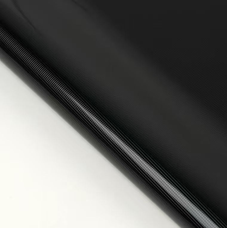 Close-up detail of black paint protection film material