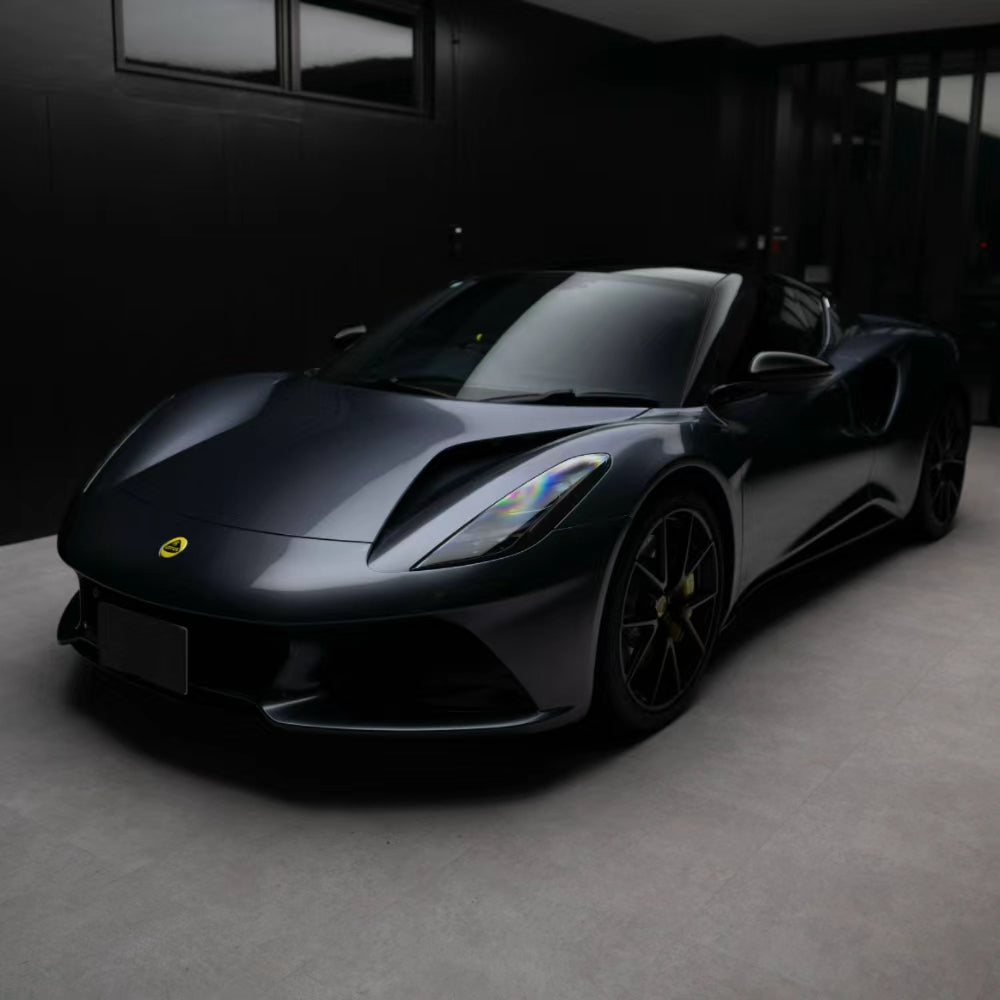 Dark sports car with a matte and satin PPF finish